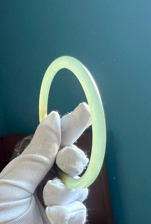 57mm Certified natural jade Qinghai nephrite icy light green with brown color Bangle 天然青海晴水料 浅冰晴水带水草沁  细圆条手镯 叮当镯 高冰润起莹光 #0765